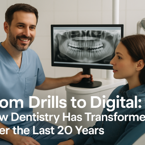 A dentist showing a digital dental X-ray to a female patient in a modern dental clinic, highlighting advances in dental technology over the past 20 years.